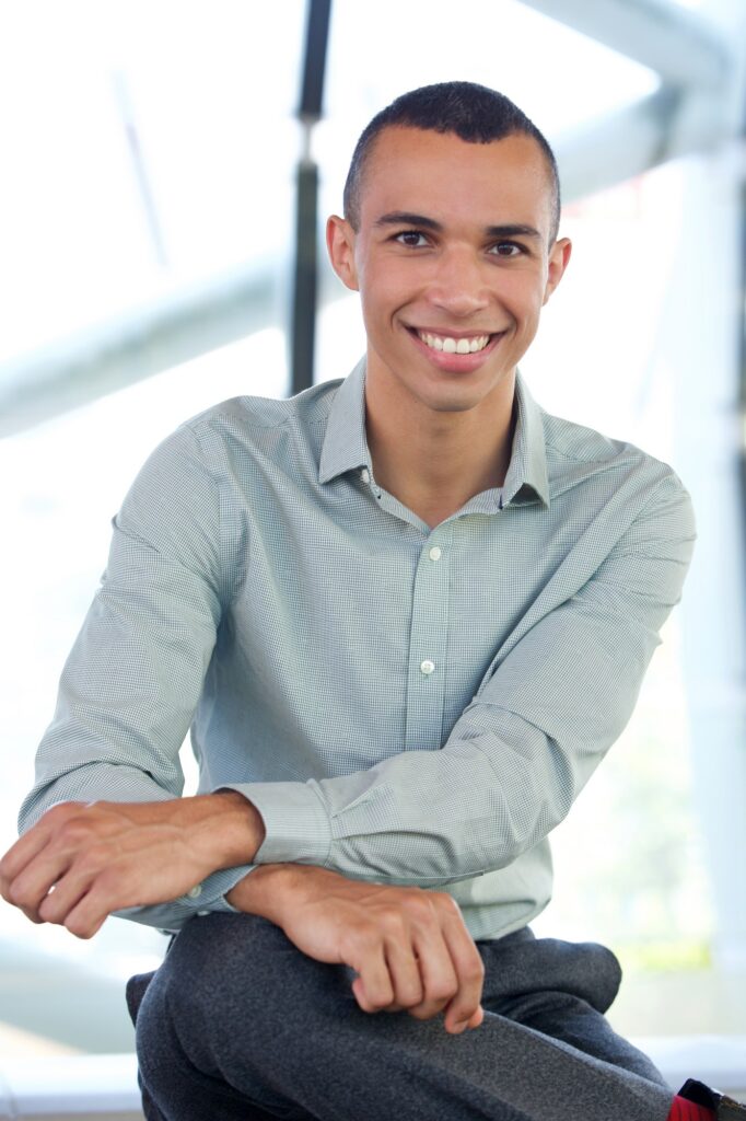 happy young businessman smiling